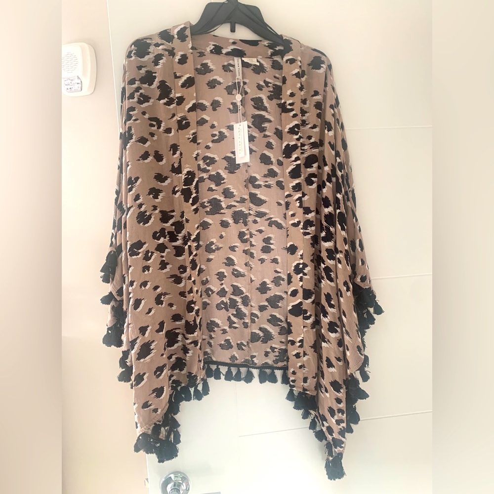 New Trina Turk leopard print bathing suit cover up with tassels. One size.